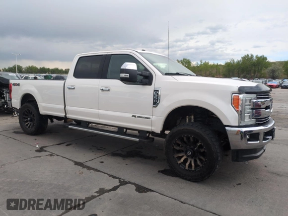 2017 Ford F-350 Platinum with VIN 1FT8W3BT1HEB31690, listed as a Copart auction lot 58369795 with 115,704 mi miles and Salvage title. Bid and sale history available at DreamBid. Image 4.