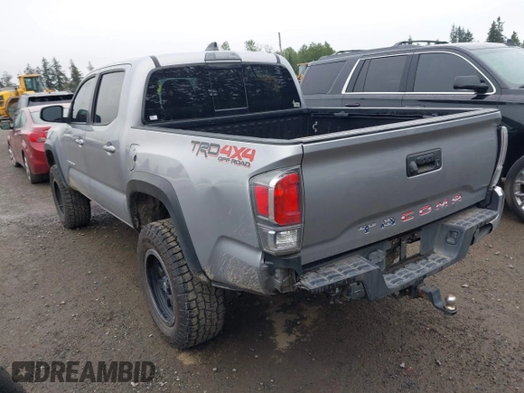 2020 Toyota Tacoma SR5 z VIN 3TMCZ5AN8LM323918, wystawiony jako IAAI lot #42279462 z przebiegiem 105 923 mil mil oraz . Historia ofert i sprzedaży dostępna na DreamBid. Obrazek 3.