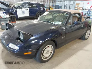 1996 Mazda MX-5 Miata z VIN JM1NA3534T0708649, wystawiony jako IAAI lot #42369564 z przebiegiem 202 690 mil mil oraz . Historia ofert i sprzedaży dostępna na DreamBid. Obrazek 2.