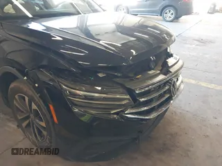 2023 Volkswagen Tiguan S z VIN 3VVRB7AX6PM069001, wystawiony jako IAAI lot #41193316 z przebiegiem 21 586 mil mil oraz . Historia ofert i sprzedaży dostępna na DreamBid. Obrazek 20.