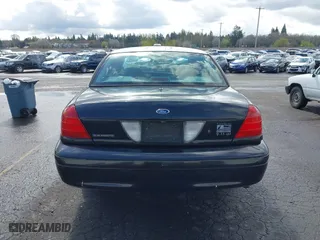 2001 Ford Crown Victoria Police Pkg Police Interceptor with VIN 2FAFP71W81X147404, listed as a IAAI auction lot 41932255 with 108,921 mi miles. Bid and sale history available at carsss.com. Image 16.
