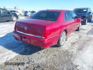 2006 Cadillac DTS w/1SC with VIN 1G6KD57Y06U210141, listed as a IAAI auction lot 41406256 with 184,569 mi miles. Bid and sale history available at carsss.com. Image 4.