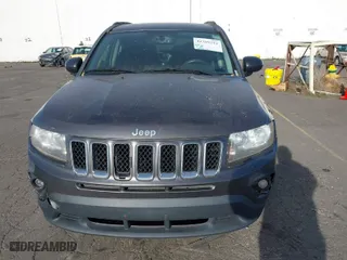2014 Jeep Compass Sport with VIN 1C4NJCBB5ED730151, listed as a IAAI auction lot 41389291 with 176,659 mi miles. Bid and sale history available at carsss.com. Image 6.