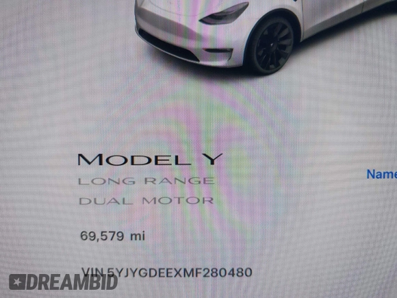 2021 Tesla Model Y Long Range with VIN 5YJYGDEEXMF280480, listed as a IAAI auction lot 41993633 with 69,579 mi miles. Bid and sale history available at carsss.com. Image 7.