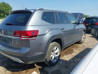 2019 Volkswagen Atlas SE with VIN 1V2WR2CA4KC620074, listed as a IAAI auction lot 42657399 with 75,306 mi miles and . Bid and sale history available at DreamBid. Image 4.