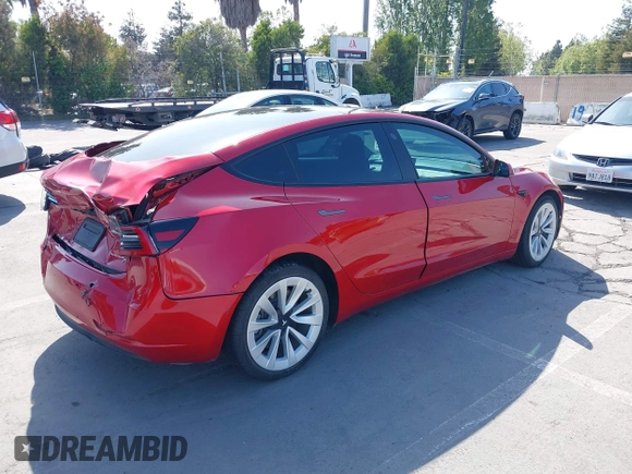 2021 Tesla Model 3 Long Range with VIN 5YJ3E1EB4MF936743, listed as a IAAI auction lot 42154322 with 46,983 mi miles and . Bid and sale history available at DreamBid. Image 4.