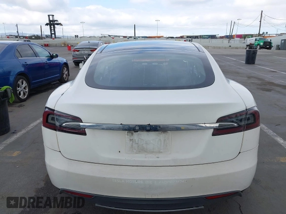 2014 Tesla Model S 60 with VIN 5YJSA1H14EFP34738, listed as a IAAI auction lot 42132117 with 120,898 mi miles and . Bid and sale history available at DreamBid. Image 16.