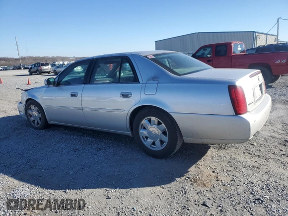 2002 Cadillac DeVille DTS with VIN 1G6KF57922U124813, listed as a Copart auction lot 87055984 with 94,769 mi miles and Salvage Title. Bid and sale history available at carsss.com. Image 2.