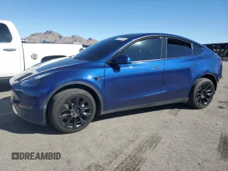 2023 Tesla Model Y Long Range z VIN 7SAYGDEE2PF908622, wystawiony jako Copart lot #47228145 z przebiegiem 10 639 mil mil oraz Szkoda całkowita • Salvage title. Historia ofert i sprzedaży dostępna na DreamBid. Obrazek 1.