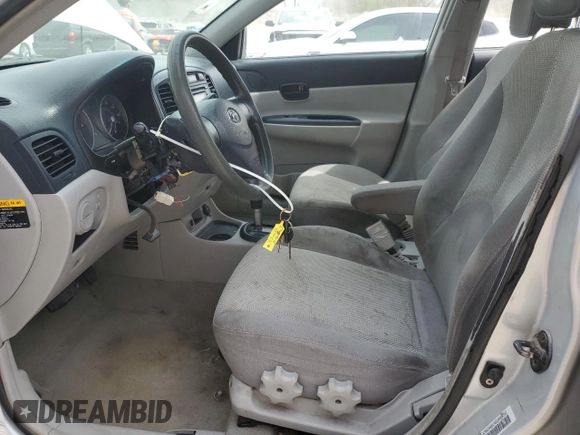 2006 Hyundai Accent GLS with VIN KMHCN46C46U048752, listed as a Copart auction lot 52930035 with 143,688 mi miles and Salvage title. Bid and sale history available at DreamBid. Image 7.