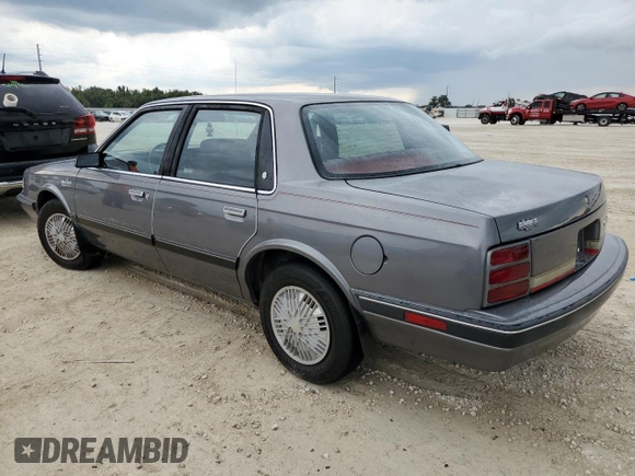 1992 Oldsmobile Cutlass z VIN 1G3AL54N4N6438104, wystawiony jako Copart lot #74415204 z przebiegiem 118 459 mil mil oraz Szkody całkowita. Historia ofert i sprzedaży dostępna na DreamBid. Obrazek 2.