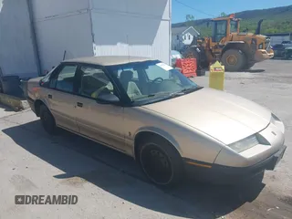1995 Saturn SL z VIN 1G8ZH5285SZ333027, wystawiony jako IAAI lot #42152252 z przebiegiem 146 000 mil mil oraz . Historia ofert i sprzedaży dostępna na DreamBid. Obrazek 1.