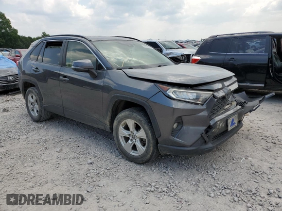 2019 Toyota RAV4 XLE with VIN JTMP1RFV8KD013125, listed as a Copart auction lot 59328465 with 106,947 mi miles and Salvage title. Bid and sale history available at DreamBid. Image 4.