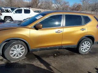 2014 Nissan Rogue SV with VIN 5N1AT2MV0EC775297, listed as a IAAI auction lot 41396616 with 214,334 mi miles and . Bid and sale history available at DreamBid. Image 14.