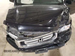 2010 Honda Ridgeline RTL with VIN 5FPYK1F5XAB011944, listed as a Copart auction lot 52434175 with 137,585 mi miles and Salvage title. Bid and sale history available at DreamBid. Image 13.
