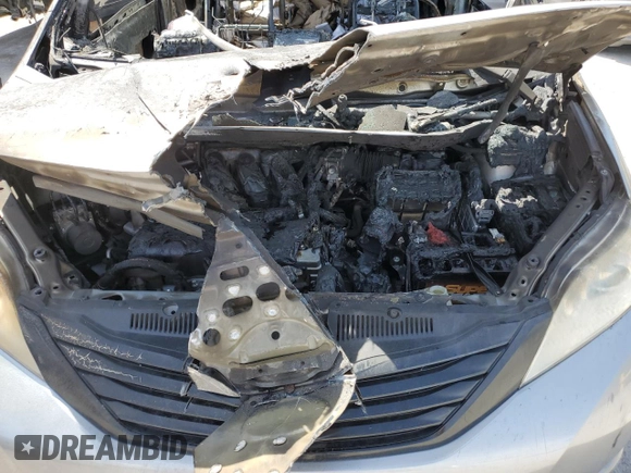 2014 Toyota Sienna L z VIN 5TDZK3DC1ES473465, wystawiony jako Copart lot #52207815 z przebiegiem Nie podano mil oraz Nie do naprawy • Non repairable. Historia ofert i sprzedaży dostępna na DreamBid. Obrazek 12.