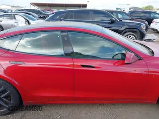2021 Tesla Model S Plaid with VIN 5YJSA1E60MF447203, listed as a IAAI auction lot 42025120 with 58,190 mi miles. Bid and sale history available at carsss.com. Image 13.