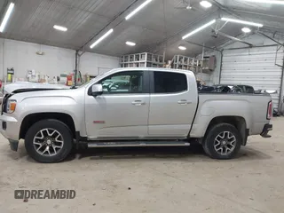 2015 GMC Canyon 4WD SLE z VIN 1GTG6BE39F1252926, wystawiony jako IAAI lot #42128396 z przebiegiem 113 139 mil mil oraz . Historia ofert i sprzedaży dostępna na DreamBid. Obrazek 14.