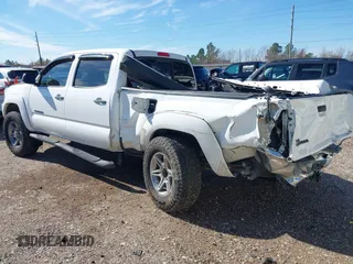 2013 Toyota Tacoma PreRunner with VIN 3TMKU4HN8DM038566, listed as a IAAI auction lot 41296386 with 153,240 mi miles and . Bid and sale history available at DreamBid. Image 3.