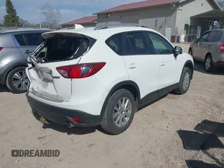 2015 Mazda CX-5 Touring with VIN JM3KE4CY8F0433357, listed as a IAAI auction lot 41814855 with 187,713 mi miles. Bid and sale history available at carsss.com. Image 4.