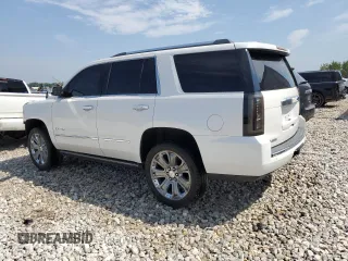 2016 GMC Yukon Denali with VIN 1GKS1CKJ3GR403865, listed as a Copart auction lot 68534264 with 129,655 mi miles and Salvage Title. Bid and sale history available at carsss.com. Image 2.