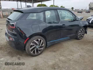 2019 BMW i3 with VIN WBY8P4C51K7D59513, listed as a Copart auction lot 59723245 with 33,759 mi miles and Salvage title. Bid and sale history available at DreamBid. Image 3.