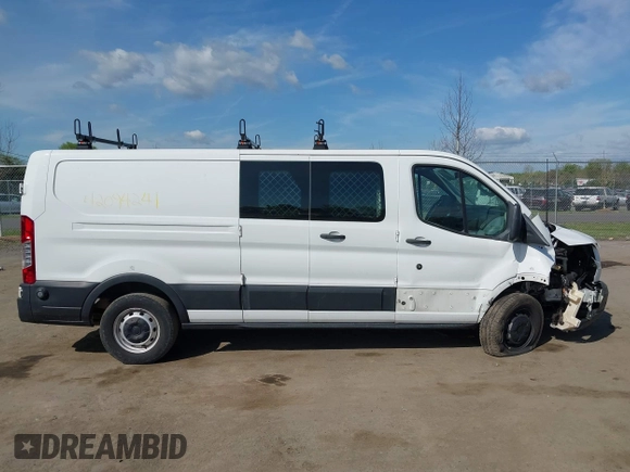2019 Ford Transit z VIN 1FTYR2ZM1KKA68132, wystawiony jako IAAI lot #42094241 z przebiegiem 154 243 mil mil oraz . Historia ofert i sprzedaży dostępna na DreamBid. Obrazek 13.
