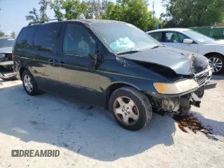 2000 Honda Odyssey EX with VIN 2HKRL1860YH599624, listed as a Copart auction lot 51588625 with Not Provided miles and Salvage Title. Bid and sale history available at DreamBid. Image 4.