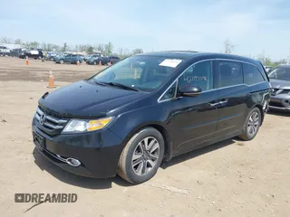 2014 Honda Odyssey Touring with VIN 5FNRL5H94EB079518, listed as a IAAI auction lot 42095098 with 141,019 mi miles and . Bid and sale history available at DreamBid. Image 18.