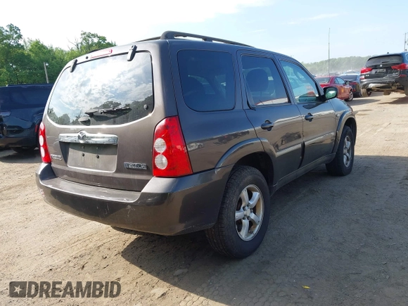 2006 Mazda Tribute LX with VIN 4F2YZ94136KM23037, listed as a IAAI auction lot 42220090 with 144,039 mi miles and . Bid and sale history available at carsss.com. Image 4.