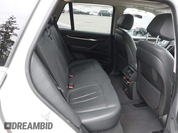 2016 BMW X5 xDrive40e z VIN 5UXKT0C55G0S77047, wystawiony jako IAAI lot #42224623 z przebiegiem 102 611 mil mil oraz . Historia ofert i sprzedaży dostępna na DreamBid. Obrazek 8.