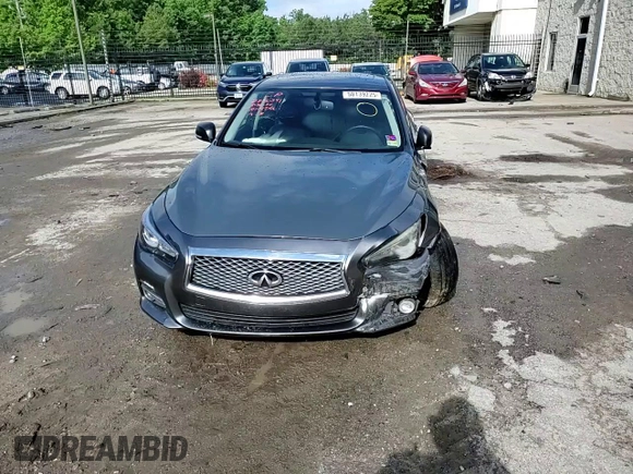 2015 Infiniti Q50 Premium with VIN JN1BV7ARXFM423026, listed as a Copart auction lot 58139225 with 130,544 mi miles and Salvage title. Bid and sale history available at DreamBid. Image 13.