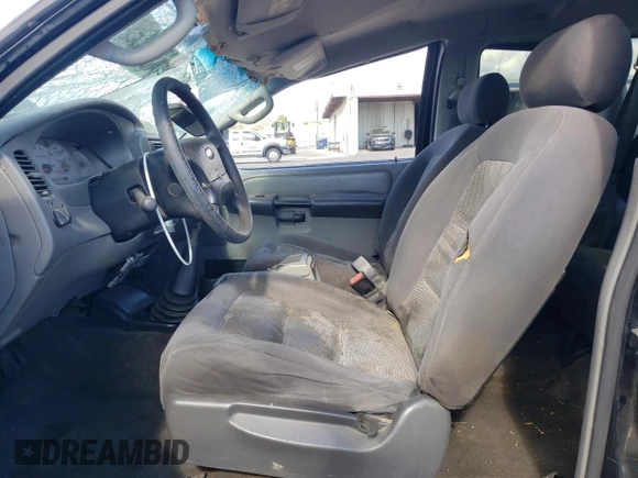 2003 Ford Explorer Sport XLS z VIN 1FMYU60E93UC12832, wystawiony jako Copart lot #71596394 z przebiegiem 197 215 mil mil oraz Szkody całkowita. Historia ofert i sprzedaży dostępna na DreamBid. Obrazek 7.