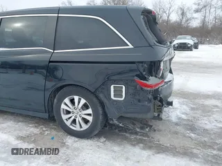 2015 Honda Odyssey EX-L with VIN 5FNRL5H60FB018030, listed as a IAAI auction lot 41608357 with 166,214 mi miles and . Bid and sale history available at carsss.com. Image 18.