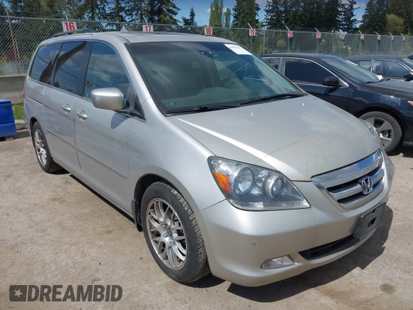 2006 Honda Odyssey TOURING with VIN 5FNRL38806B000049, listed as a IAAI auction lot 42095336 with 218,584 mi miles. Bid and sale history available at carsss.com. Image 1.