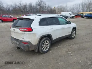 2015 Jeep Cherokee North with VIN 1C4PJMCS6FW564435, listed as a IAAI auction lot 41992440 with 166,048 mi miles. Bid and sale history available at carsss.com. Image 4.