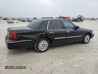2004 Mercury Grand Marquis GS z VIN 2MEFM74W24X636561, wystawiony jako Copart lot #46114155 z przebiegiem 125 121 mil mil oraz Szkoda całkowita • Salvage title. Historia ofert i sprzedaży dostępna na DreamBid. Obrazek 3.