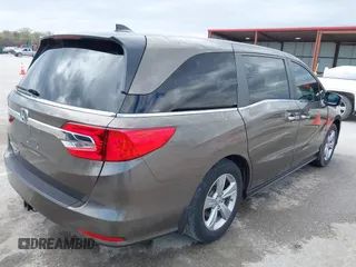 2018 Honda Odyssey EX-L z VIN 5FNRL6H76JB082421, wystawiony jako IAAI lot #41914032 z przebiegiem 66 133 mil mil oraz . Historia ofert i sprzedaży dostępna na DreamBid. Obrazek 4.