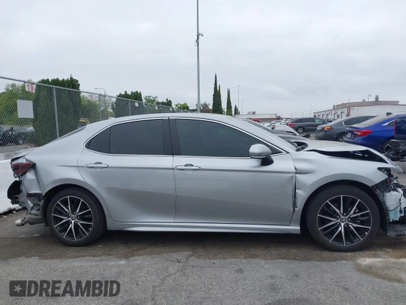 2023 Toyota Camry SE with VIN 4T1G11AKXPU809876, listed as a IAAI auction lot 42100546 with 35,055 mi miles and . Bid and sale history available at DreamBid. Image 13.