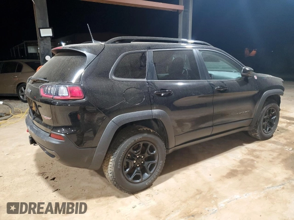 2022 Jeep Cherokee Trailhawk with VIN 1C4PJMBX5ND526816, listed as a Copart auction lot 87394464 with 25,070 mi miles and Salvage Title. Bid and sale history available at carsss.com. Image 3.