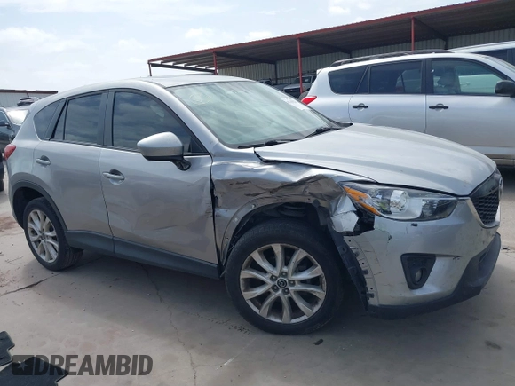 2013 Mazda CX-5 Grand Touring with VIN JM3KE4DE6D0160713, listed as a IAAI auction lot 41749221 with 158,056 mi miles. Bid and sale history available at carsss.com. Image 14.