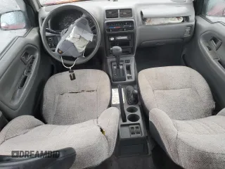 1998 Suzuki Sidekick z VIN JS3TD21VXW4103386, wystawiony jako Copart lot #86219924 z przebiegiem 172 959 mil mil oraz Szkody całkowita. Historia ofert i sprzedaży dostępna na DreamBid. Obrazek 8.