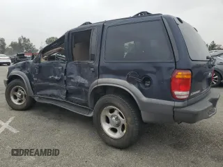 1999 Ford Explorer XLT with VIN 1FMZU34E6XZC14009, listed as a Copart auction lot 55251525 with 253,681 mi miles and Salvage title. Bid and sale history available at DreamBid. Image 2.