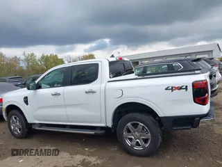 2024 Ford Ranger XLT with VIN 1FTER4HH1RLE20889, listed as a IAAI auction lot 40593441 with 7,499 mi miles. Bid and sale history available at carsss.com. Image 14.