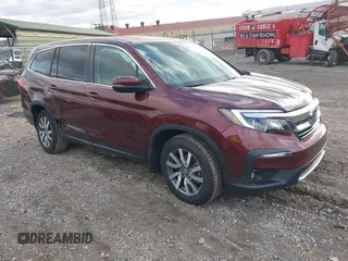2021 Honda Pilot EX-L with VIN 5FNYF6H5XMB055146, listed as a IAAI auction lot 41495626 with 28,853 mi miles. Bid and sale history available at carsss.com. Image 1.