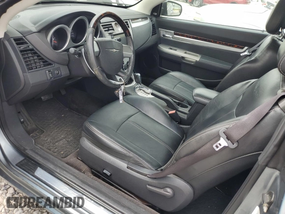 2010 Chrysler Sebring Limited z VIN 1C3BC6EV5AN144868, wystawiony jako Copart lot #66549774 z przebiegiem 106 602 mil mil oraz Szkoda całkowita • Salvage title. Historia ofert i sprzedaży dostępna na DreamBid. Obrazek 7.