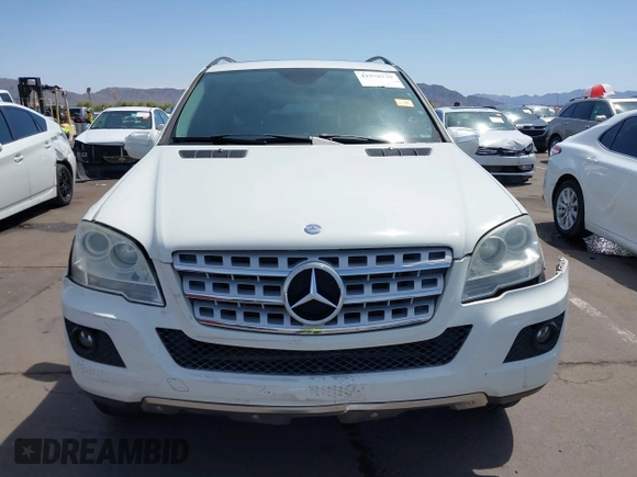 2010 Mercedes-Benz M 350 with VIN 4JGBB5GBXAA591503, listed as a IAAI auction lot 41970139 with 190,453 mi miles and . Bid and sale history available at DreamBid. Image 12.