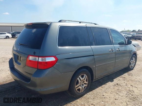 2007 Honda Odyssey EX-L with VIN 5FNRL38767B452922, listed as a IAAI auction lot 41917482 with 282,542 mi miles and . Bid and sale history available at DreamBid. Image 4.