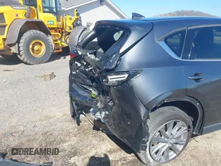 2020 Mazda CX-5 Grand Touring with VIN JM3KFBDM1L0821975, listed as a IAAI auction lot 40088794 with 68,895 mi miles and . Bid and sale history available at DreamBid. Image 21.