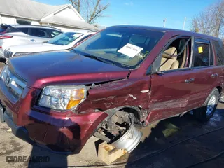 2007 Honda Pilot LX with VIN 2HKYF18167H510970, listed as a IAAI auction lot 40827681 with 119,011 mi miles. Bid and sale history available at carsss.com. Image 6.